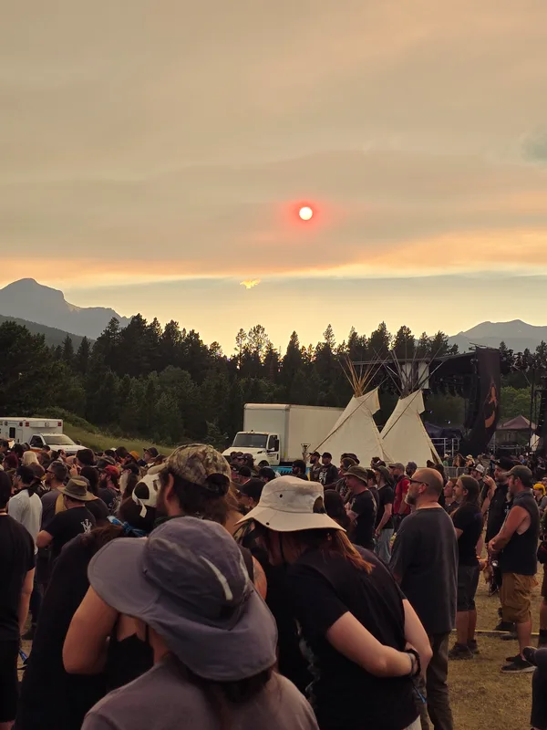 A red moon above the crowd